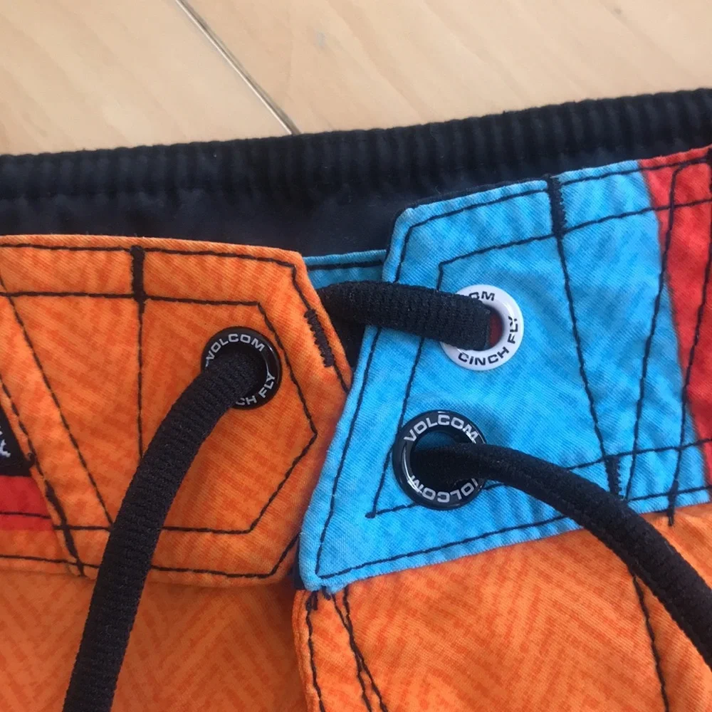 Volcom swim trunks size 33‎ orange and turquoise great condition